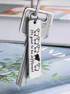 1 stainless steel sheep keychain - white with black sheep ornament and the inscription "Being different is a good thing" - a symbolic gift of personality, suitable for Carnival/Christmas/Thanksgiving - a durable daily accessory
