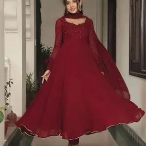 Elegant Maroon Anarkali Suit with Embellished Sleeves and Flared Skirt for Festive Wear
