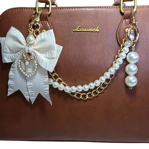 Pearl Bow Charm and Chain Bag Accessory Set Gold Cream with Elegant Bow and Faux Pearls for Stylish Handbags
