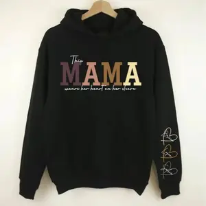 This Mama Wears Her Heart On Her Sleeve Hoodie, Personalized Mama Sweatshirt Names On Sleeve, Mother's Day Gift Mom Heart On Sleeve Hoodie, Mom Shirt