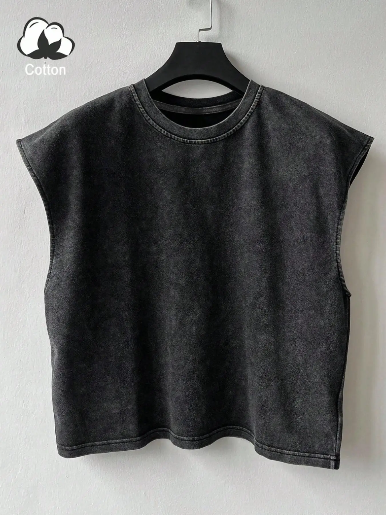 Men's solid color, washed cotton vest. The cropped, sleeveless design exudes Fashion street style vibe, making it an ideal choice for everyday Casual summer wear in menswear. The sleeveless design ensures comfort and freedom of movement.