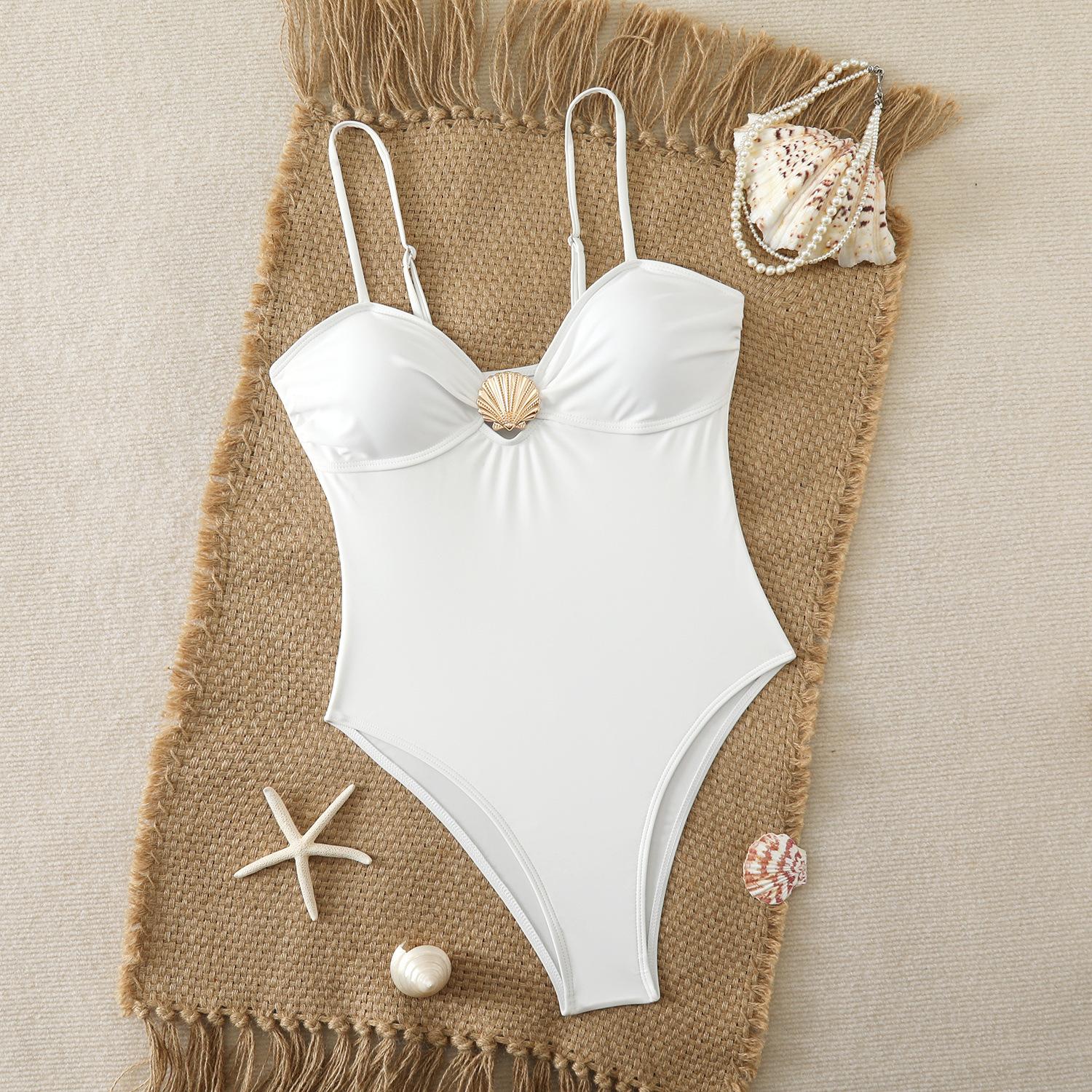 European and American sexy slim-fit women's swimwear wholesale in Xingcheng, nylon swimsuit with metal shell decoration, one-piece swimsuit