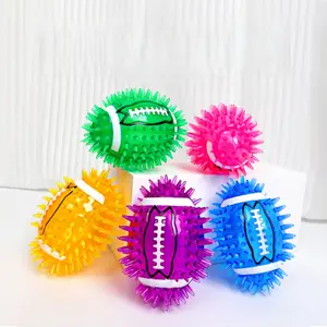 New dog toy,  TPR sound-making football, rugby spiky ball, teeth grinding and cleaning toy ball