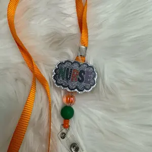 Nurse Badge Reel Lanyard with Orange Ribbon and Green Bead Accent