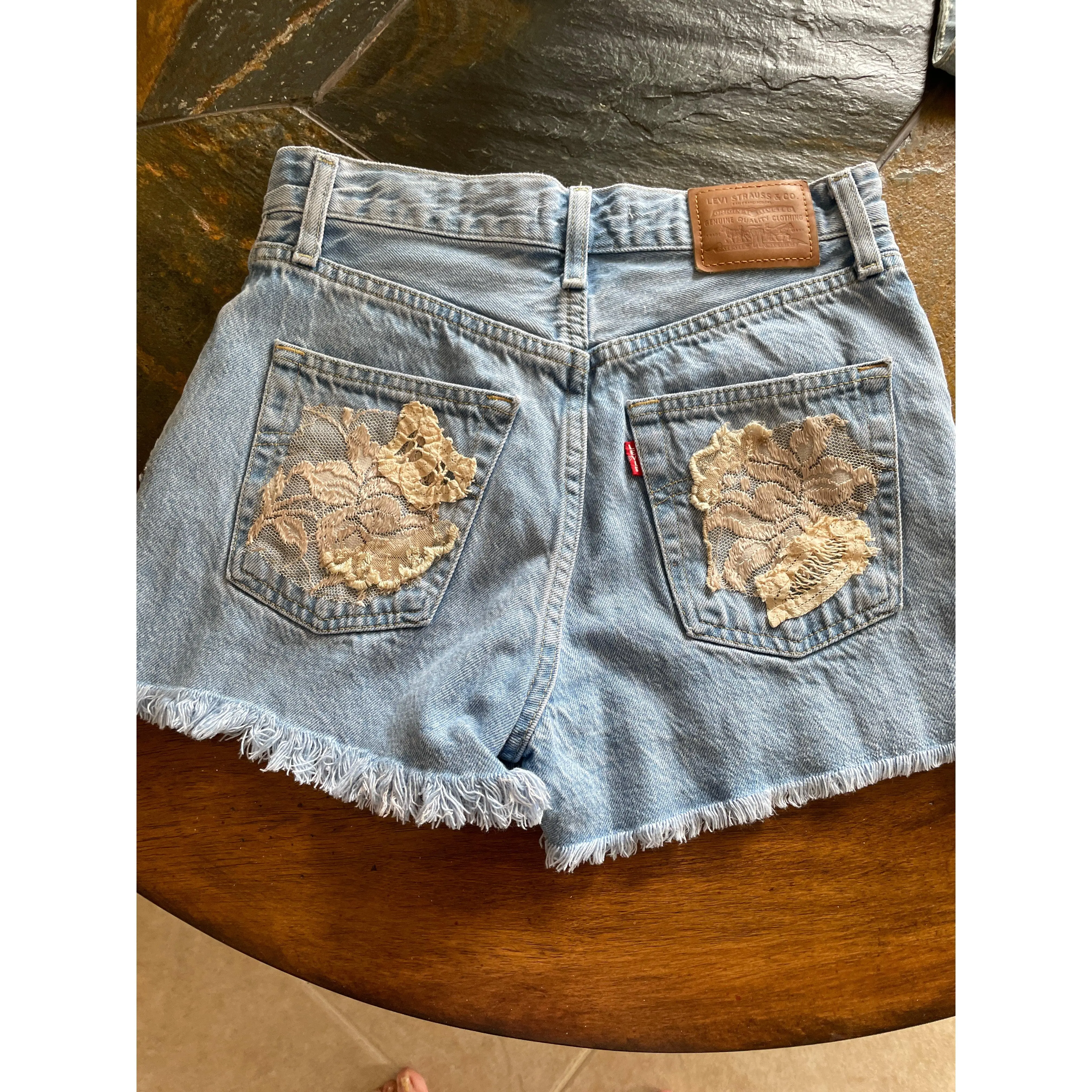 Cotton Blend Denim Fringed Pockets Hand Stitched Lace Accent Ribcage Shorts