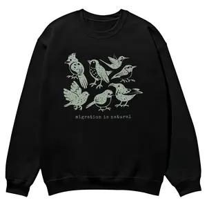 "Migration Is Natural" Anti ICE crewnecks for men and women, full color fall sweatshirts, fun and cozy patterned sweaters, unisex fall clothing
