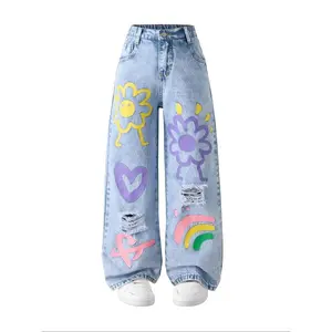 Girls’ autumn new wide-leg jeans with a heart-shaped floral print and snowflake wash, featuring patterned denim—cute, loose fit, suitable for all seasons GARMENTARY