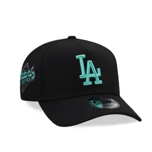 Los Angeles Dodgers New Era 9FORTY Snapback Baseball Cap – Black, flat brim, white LA logo and commemorative badge on the side, MLB streetwear accessory.