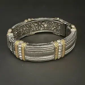 Signature closure bangle