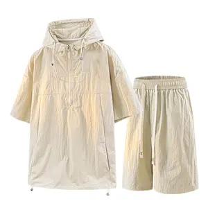 New Summer Men’s Hooded Half-Zip Lightweight Short-Sleeve Two-Piece Set — Loose Fit, Breathable Quick-Dry Sportswear for Daily Commute, Street Casual Style, Versatile Sun-Protective Top with Drawstring Shorts Outfit