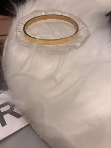 Stainless steel accessories plated with 14K gold, ensuring durability and color retention.