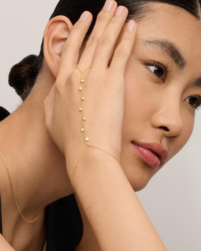 PAVOI 14K Gold Plated Hand Chains for Women - Dainty Cubic Zirconia Bracelet and Ring Handchain Jewelry - Lightweight Trendy Hand Chain Bracelet