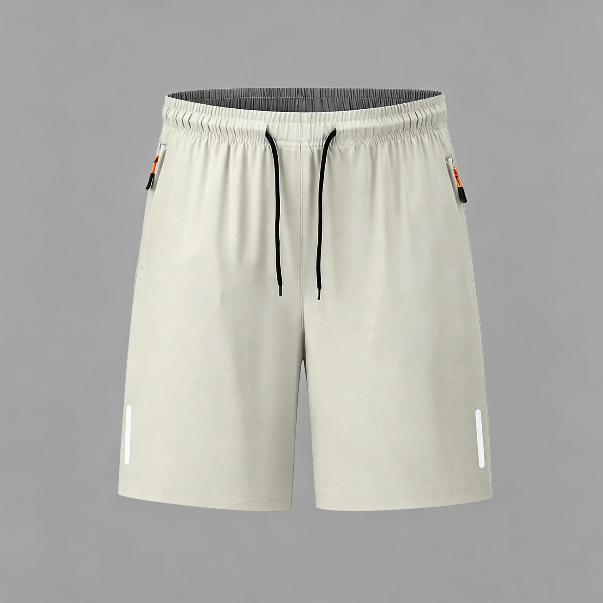Men’s casual shorts—loose, comfortable, and breathable athletic shorts with reflective stripes on both sides of the legs. Available in multiple colors and suitable for all seasons; ideal for outdoor sports and fitness activities.