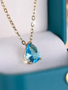 A gold teardrop sea blue sparkling zirconia necklace is fashionable, high-end and simple, suitable for women to wear during proposals, travels and daily life
