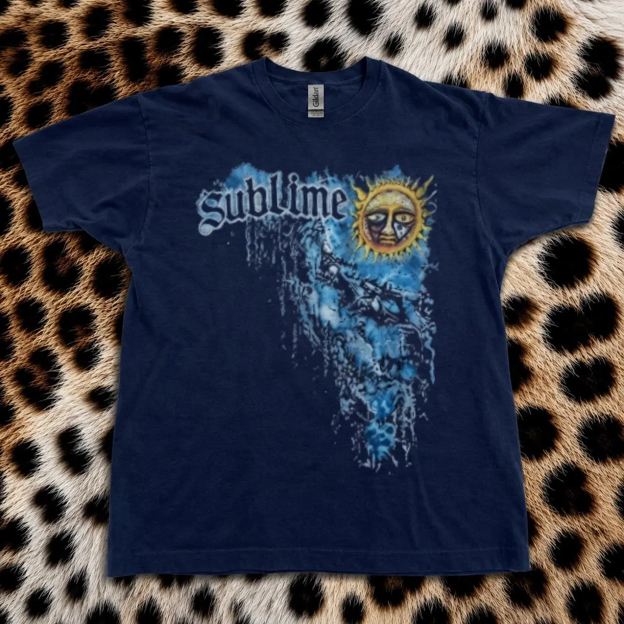 Vintage Sublime Band Tee Featuring an Iconic Blue Sun Face Graphic Vintage Sublime Band Tee Featuring an Iconic Blue Sun Face Graphic