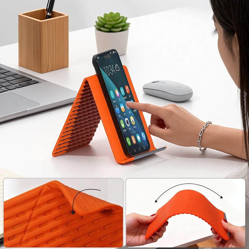 Multifunctional silicone folding mobile phone stand – ideal for frequent users of digital devices. Suitable for use on office desks, in the kitchen for following recipes, for portable storage whilst travelling, and as a non-slip mount in the car.