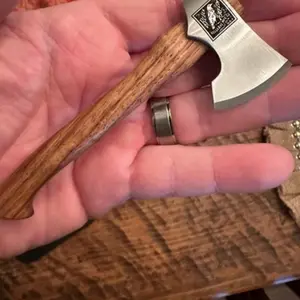 Tribute Black Raven mini axe display with display stand. High quality 4 inch mini axe laser etched with your favorite logos/graphic. Great for business promotions, gifts for axe enthusiast or to just display in your home or office