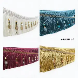 1 meter long, 11 cm wide. Large tassels layered with beads, background decoration. Gold tassel and bead pendant. Suitable for curtains, wedding decorations, table runners, lace, and DIY crafts.