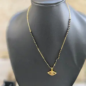 Stunning Evil eye gold plated Mangal Sutra are available in two different designs.