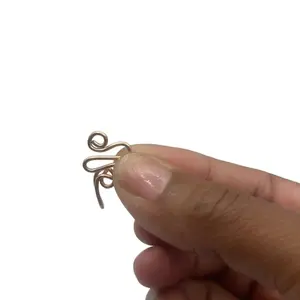 Goddess is Adjustable Nose Cuff - As Seen in the Image Featuring a Hand Holding a Unique Object