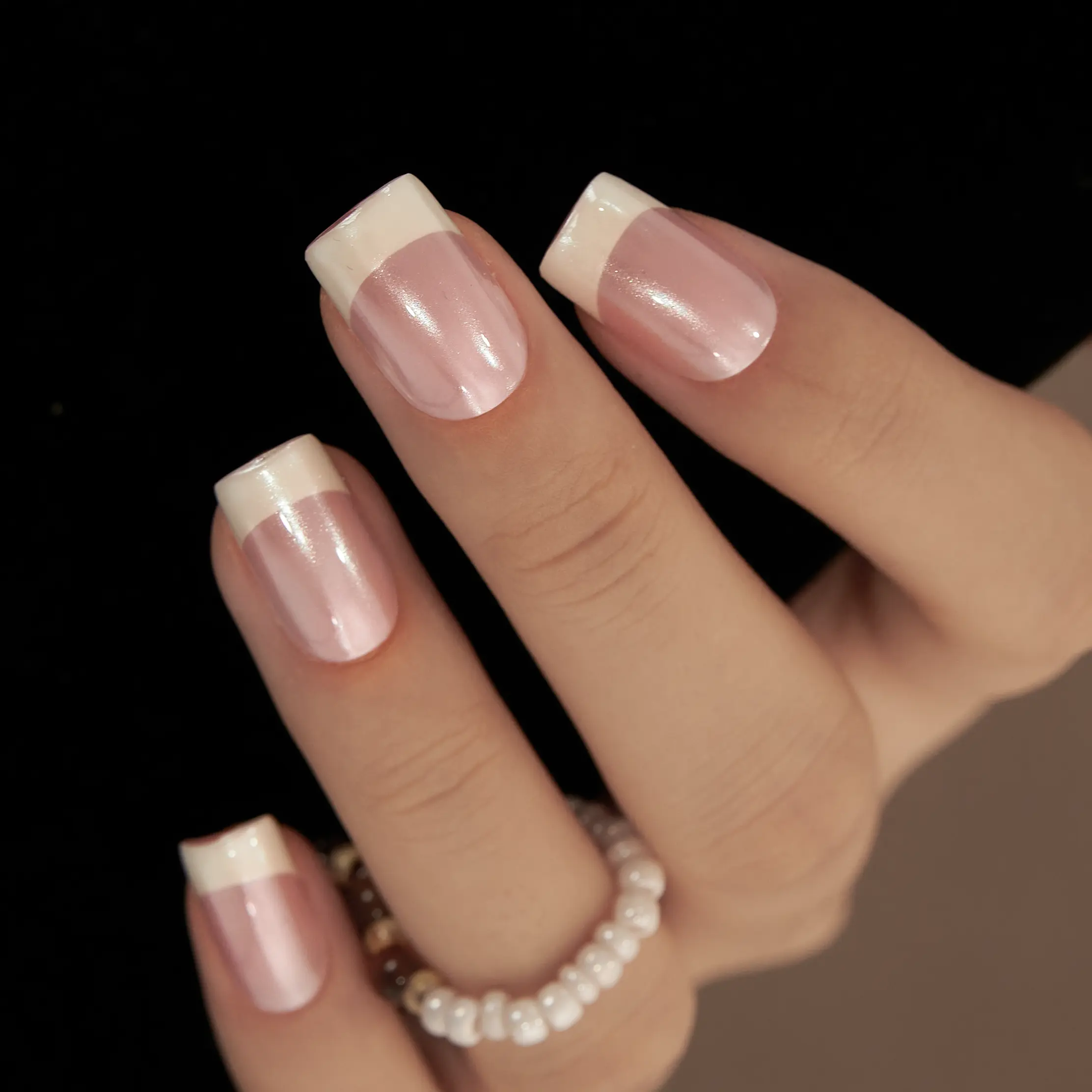 Chic Pink Bliss Nail Art – Soft, glossy pink nails with a playful twist, featuring delicate wavy white and pastel pink accent stripes. Perfect for adding a pop of color and charm to any look, this style blends sweetness and sophistication effortlessly