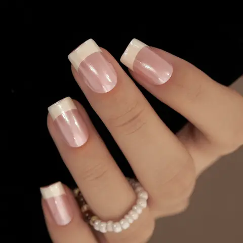 Chic Pink Bliss Nail Art – Soft, glossy pink nails with a playful twist, featuring delicate wavy white and pastel pink accent stripes. Perfect for adding a pop of color and charm to any look, this style blends sweetness and sophistication effortlessly
