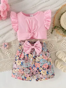 Summer Girls' Simple Cozy Solid Color Ribbed Knot Short Sleeve Round Neck Top + Floral Print Bow Trim Ruffle Shorts Two-Piece Outfit Special Gift Set