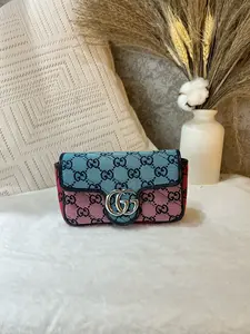 Pre-owned GUCCI GG Marmont Mini Crossbody Bag in multicolor GG Supreme canvas. Features the iconic silver tone Double G logo 1919H0831