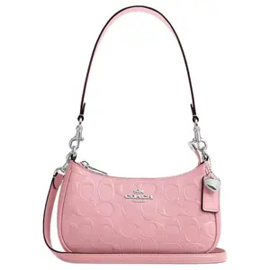 COACH Teri 20 Mini Crossbody Bag with Heart Pendant and Adjustable Strap in Pink Glossy Leather