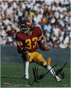 Marcus Allen USC Trojans Autographed 8" x 10" Red Jersey Rushing Photograph with "Heisman 81" Inscription - Fanatics Authentic Certified