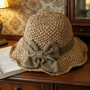 Versatile Vintage Hand-Woven Straw Hat — An Elegant French-Style Sun Hat Adorned with a Ruffled Bow. Foldable for easy storage, breathable, and comfortable—perfect for travel and beach outings.