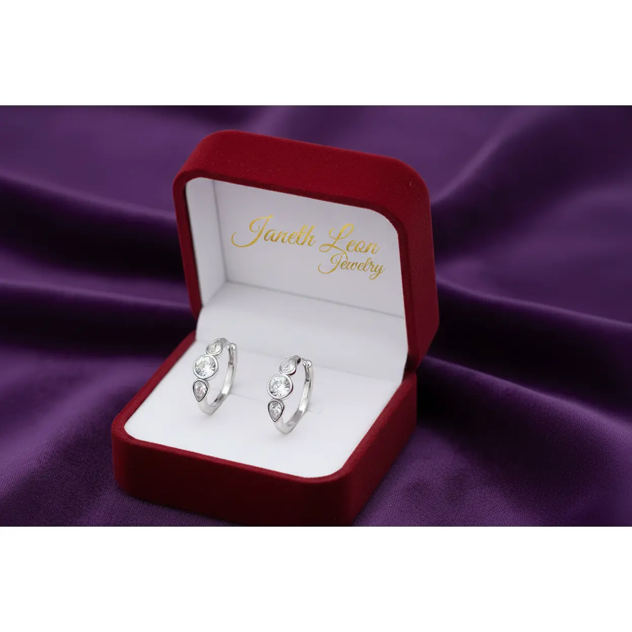 Platinum plated earrings with crystal tone stones modern design