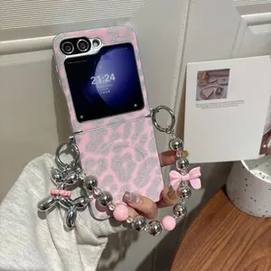 Silver-edged magnetic pink leopard print phone case Casing, magnetic support for wireless charging, compatible with Samsung Galaxy Z Flip 7 6 5 4 3, optional wrist strap, combines stylish design with durable protection, ideal for women.
