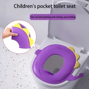 Dinosaur cartoon baby training toilet seat, Potty Training Seat, Potty Trainer Seat, TPE soft plastic wrapped folding portable toilet seat PP material is suitable for most toilets, suitable for families, hotels, with travel storage bags