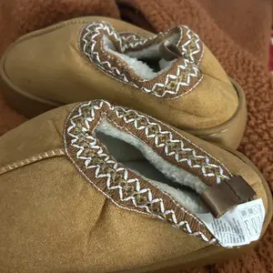 Children's slipper bag heel autumn winter boys and girls indoor home fur shoes soft sole 2025 new retro style simple and generous thick soled children's shoes autumn winter snow boots