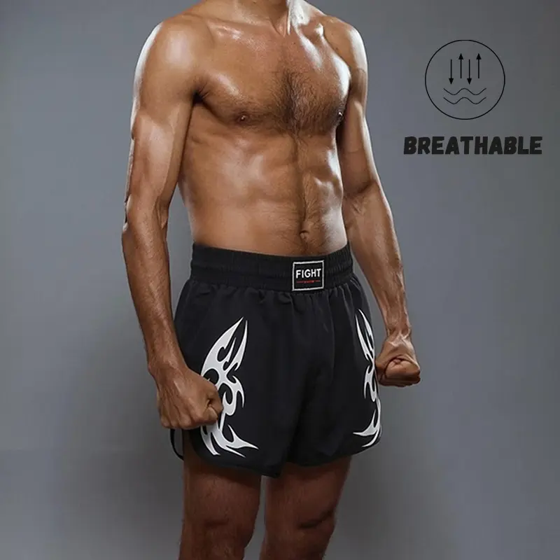 Men’s tribal totem print shorts with a wide elastic waistband, breathable polyester fabric, side slits at the hem—ideal for mixed martial arts, free sparring, training, and fitness activities.
