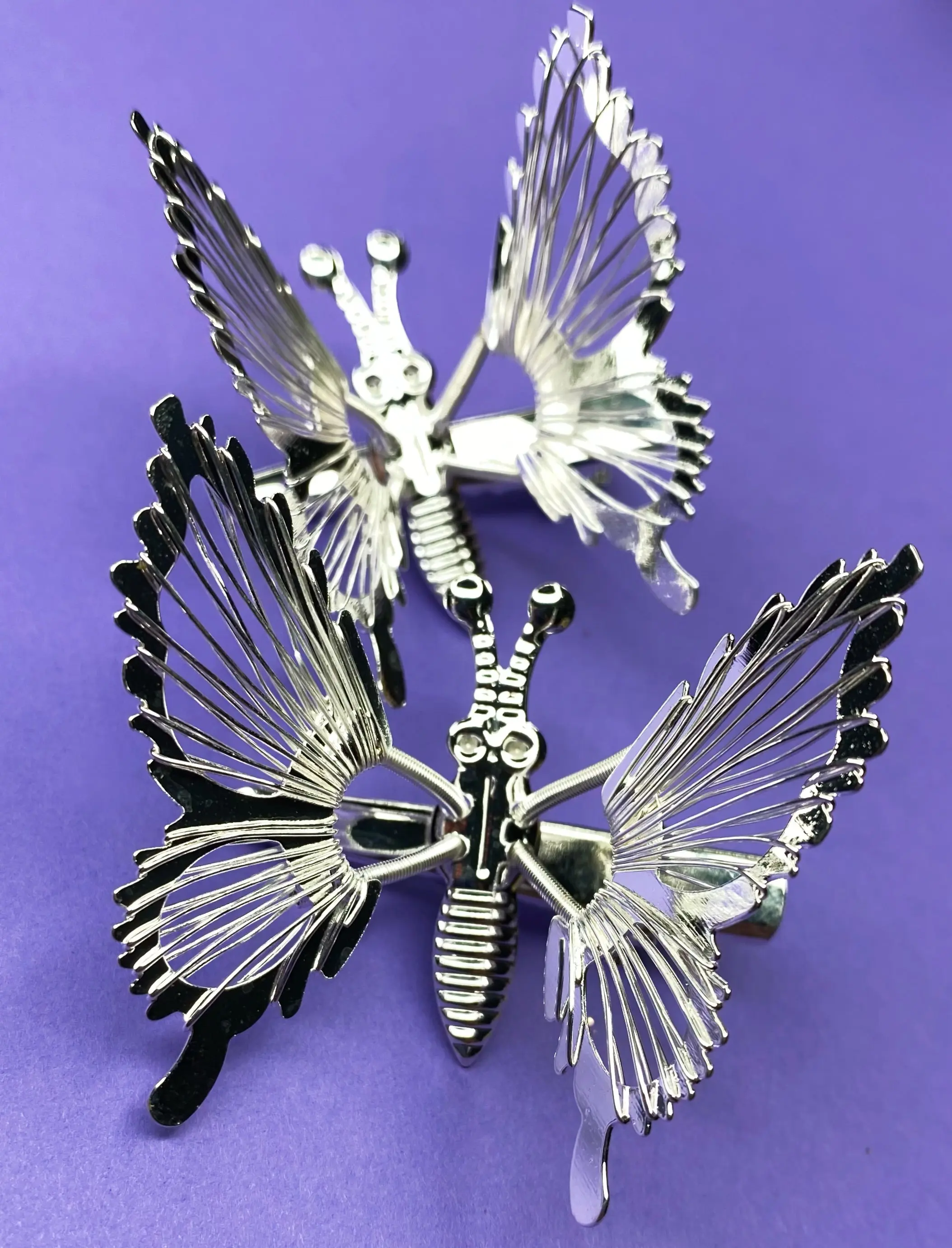 VINTAGE SILVER FLUTTERING BUTTERFLY CLIP