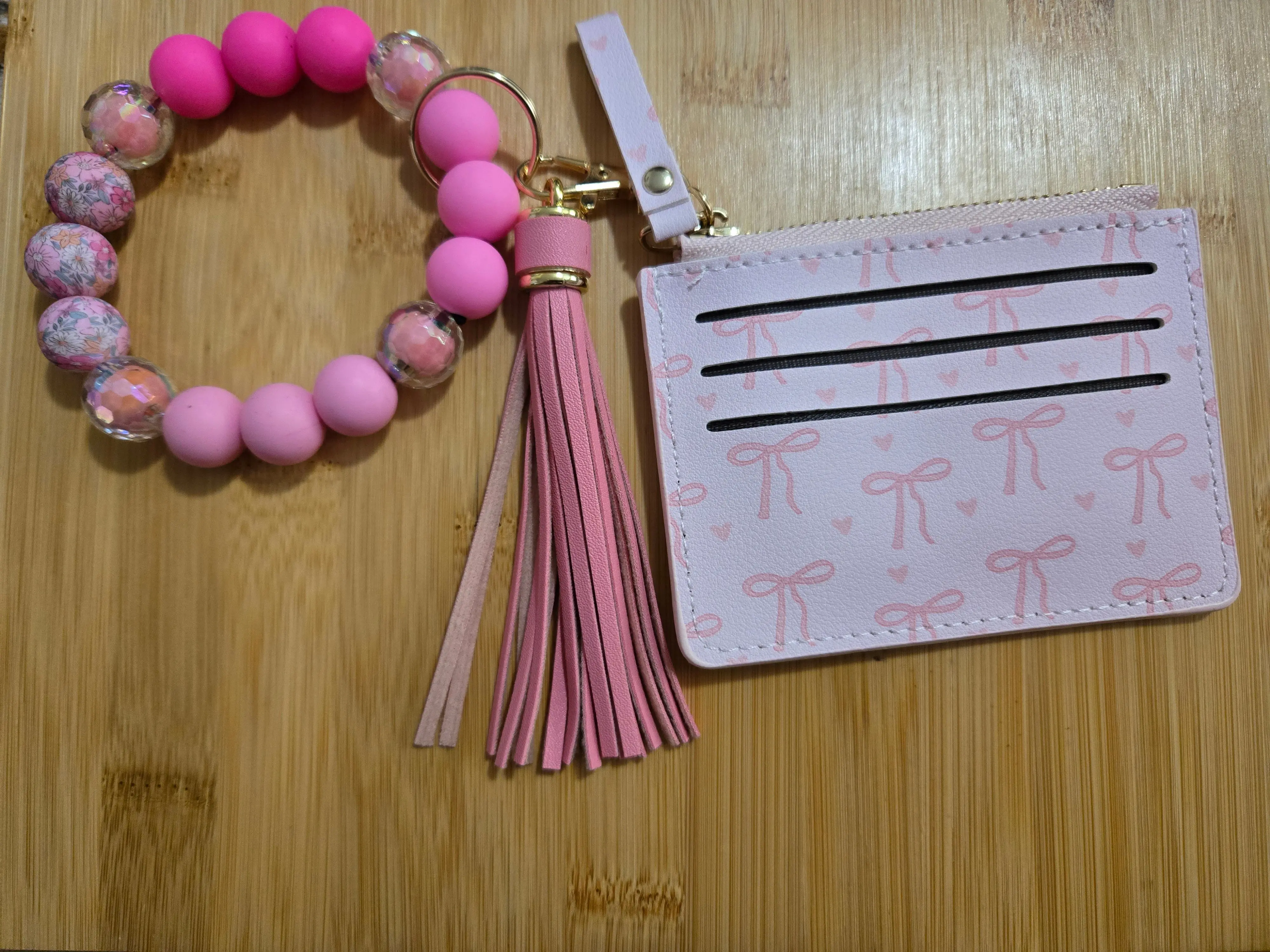 Light Pink with bows beaded wristlet