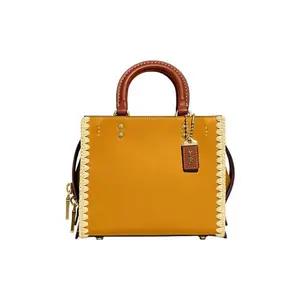 COACH Rogue 20 Small Leather Crossbody Bag with Embossed Logo and Zipper Closure for Women in Buttercup Yellow