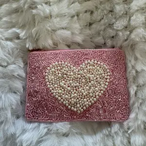 Handmade Pink Coin Beaded Purse with Heart Design and Pearl Accents for Elegant Everyday Use