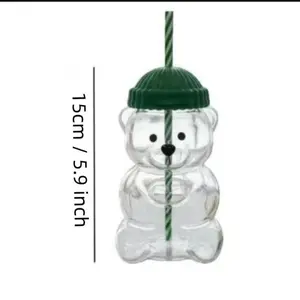 Adorable Teddy Bear Glass Straw Cup Seasonal Drinkware Coffee & Beverage Cup with Green & Pink Lids High Borosilicate Glass Tumbler for 2026 Holiday Collection Mug Shaped Tumblers Bottles ice  coffee  glass