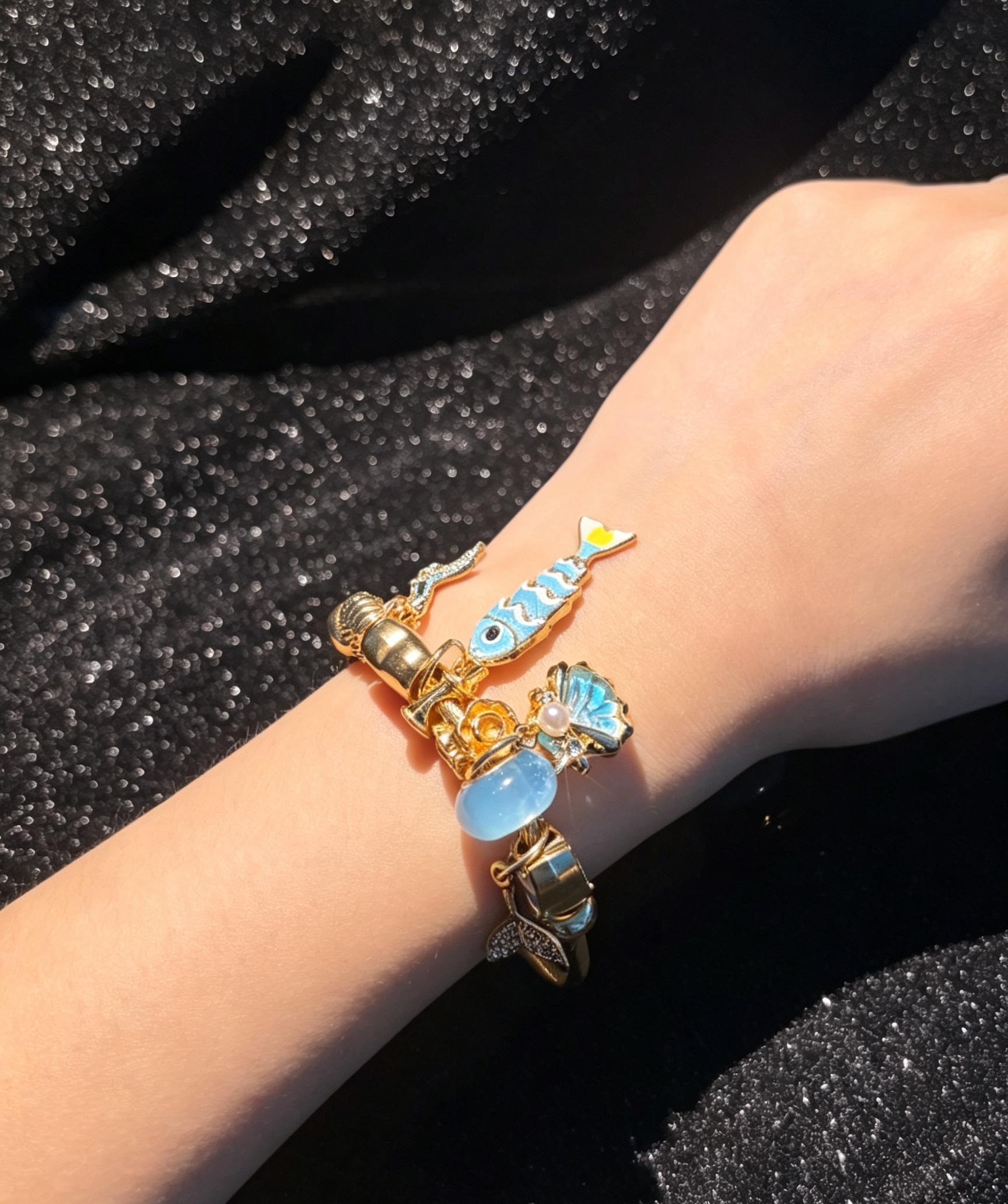 Women's Gold-Tone Ocean Theme Charm Open Cuff Bracelet with Fish, Starfish & Shell Charms, Beach Costume Jewelry Gift