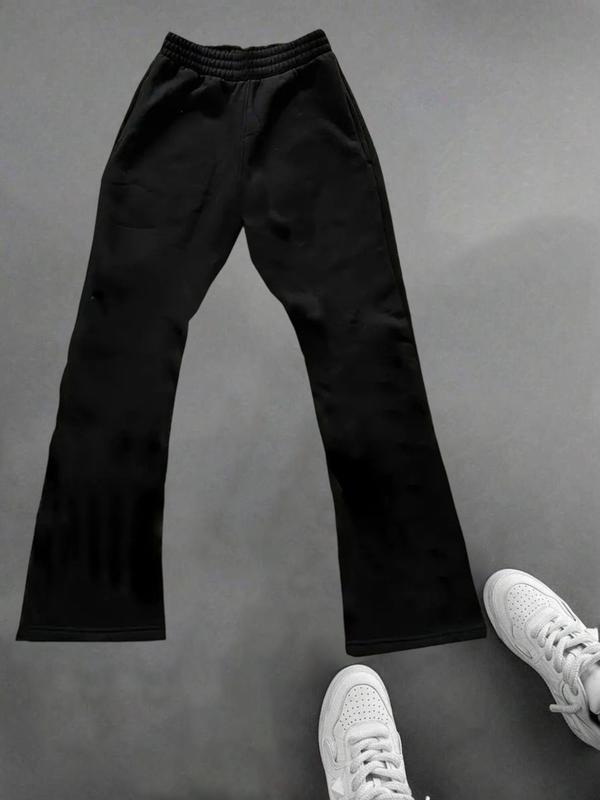 Men's black casual trousers with cross pattern print, elastic waist drawstring pants, suitable for autumn and winter wear.