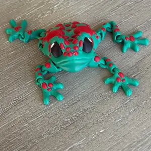 3D Printed Articulated Frog Toy with Green Body and Red Spots for Kids' Play