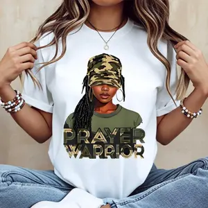 Casual Women's White TShirt Featuring Prayer Warrior Graphic Paired with Camouflage Hat and Braided Hair for Daily Wear