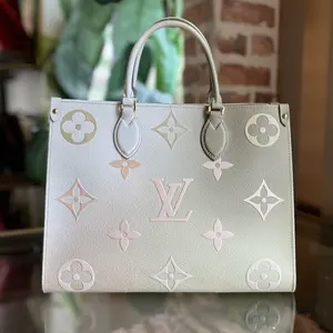 Pre-owned Louis Vuitton canvas Crossbody Bags OnTheGo MM Sunset Kaki Spring in the City Monogram Tote