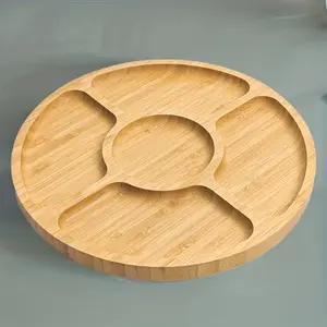 A Bamboo Round Snack Tray with Five Compartments, Suitable for Serving Snacks, Storing Items, And Using on Coffee Tables. It Is Made of Food-Grade Materials And Is Perfect for Home Decor, Desserts, Snacks, And Fruits
