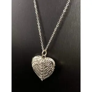 Heart-Shaped Wings Locket Necklace