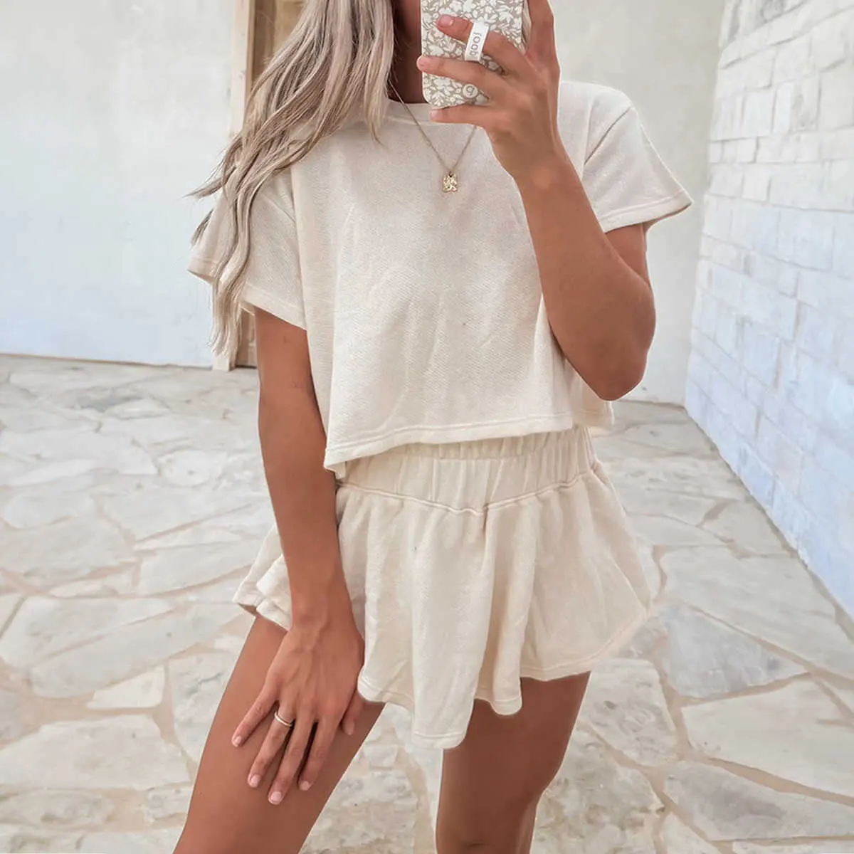 Beige 2pcs Cropped Tee and Ruffle High Waist Skort Set for Casual Look and Playful Style