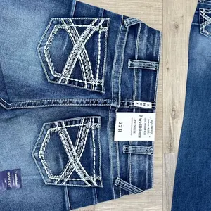 Boot cut Light Wash boots With flower gem on pocket empire jeans